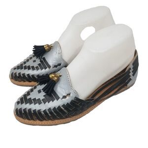 TORTUGA LEATHER SLIPONS WITH TASSELS. SIZE 26. BLACK AND SILVER.